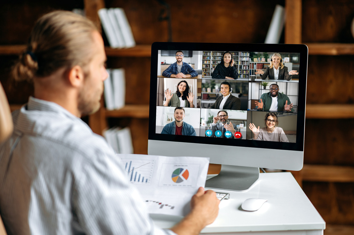 An instructor leading a virtual class with students on screen