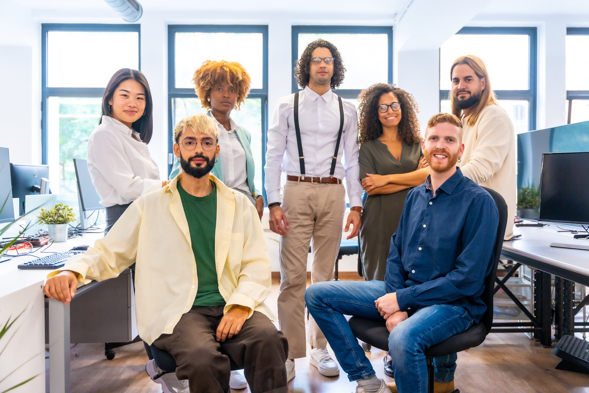 Young multi-ethnic learners smiling together