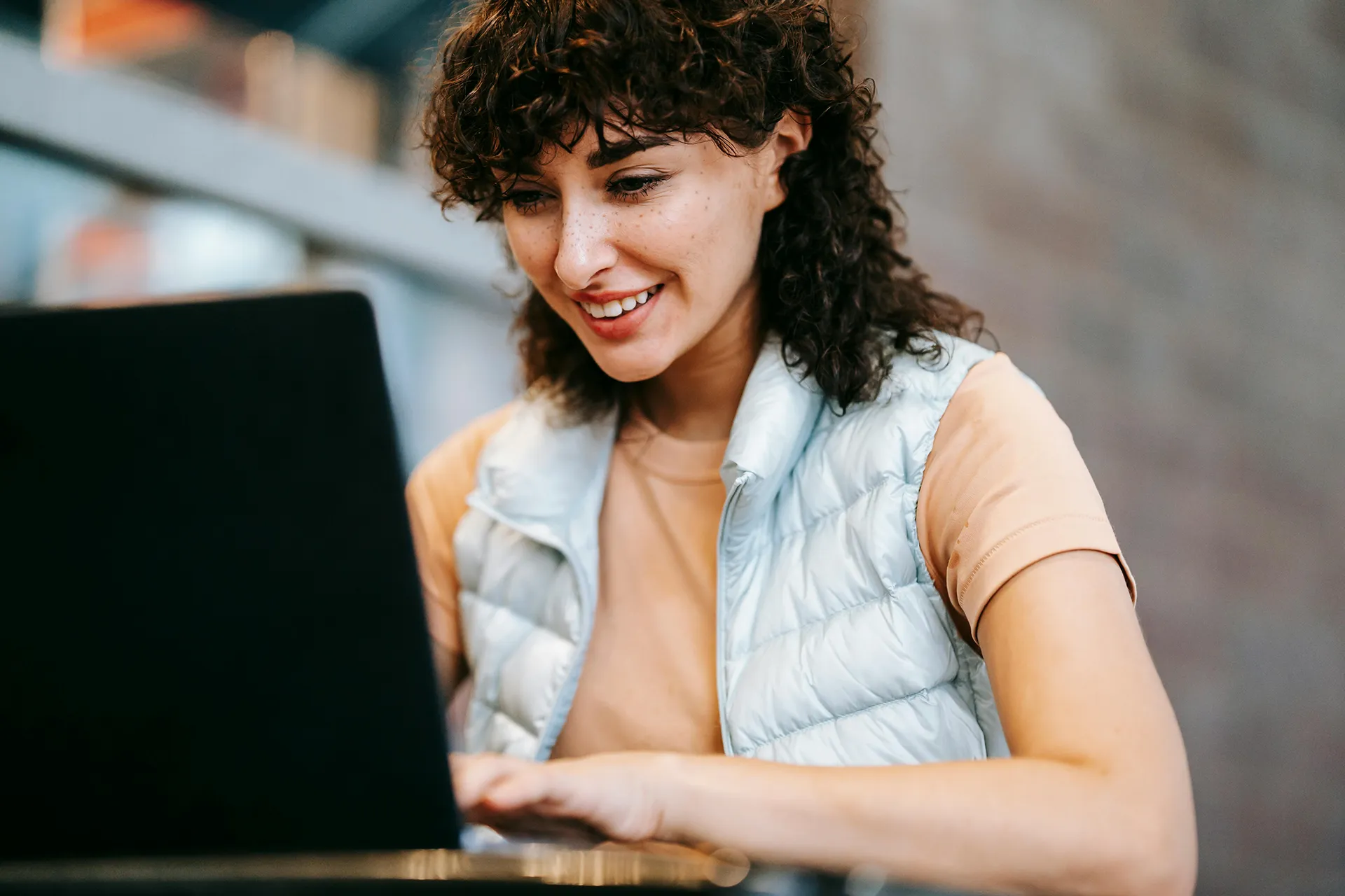 A Prepr program participant working on a laptop